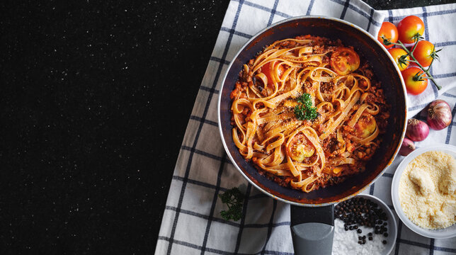 Italian cuisine, Pasta Bolognese. Top View with copy space