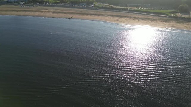 High Angle Drone Camera Footage of Newcastle upon Tyne Beach and Ocean. The Footage Was Captured at Just Before Sunset From Medium High Altitude From Sea Level on 13th October, 2025. 