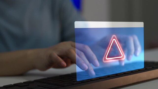 Cybersecurity warning alert virtual displayed while user typing keyboard, digital security risk, system error, data online protection, cyber threat and internet safety technology.