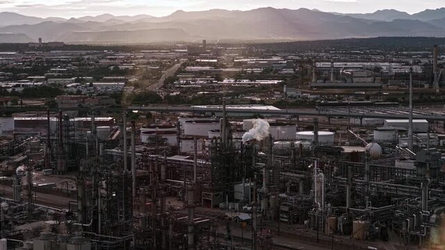Oil refinery overview sunset drone video Denver Colorado 4K