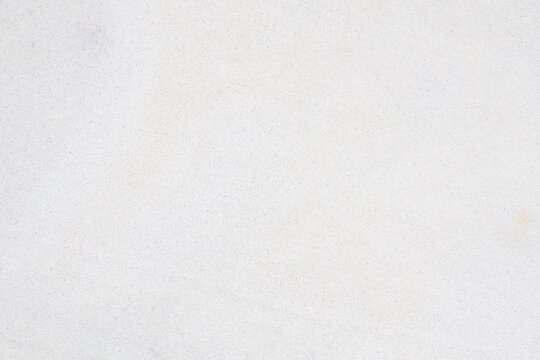 White concrete wall texture background, light grey plaster surface for design backdrop.