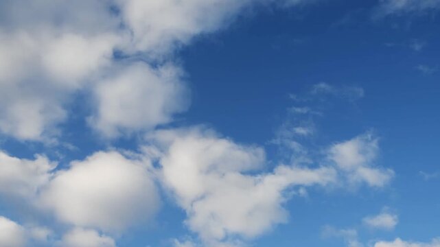 White clouds in the blue sky at sunny day. Clouds forming and moving in the sky. Real time video. Abstract nature background
