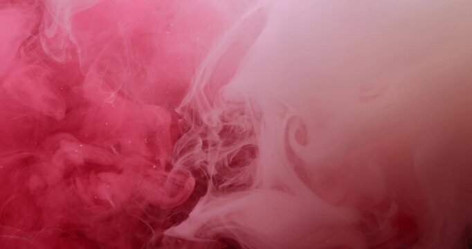Dye flow. Art fog. Defocused pink color pigment underwater paint smoke texture droplets mix smog water spreading on abstract background.