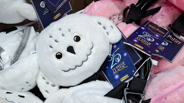 Close up of Miniso Harry Potter Hedwig owl plush backpack with 25 Years of Magic tag on September 16  2026 in Bangkok, Thailand 