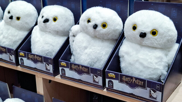 Miniso Harry Potter Hedwig electric plush toy in box packaging lined on store display shelf on September 16, 2026 in Bangkok, Thailand 