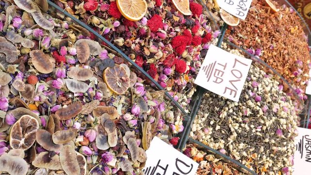 Close up view of various types of herbal tea in spice market in grand bazaar.