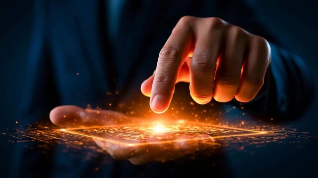 Human Hand Touching Glowing Orange Holographic Screen