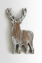 A Christmas wooden deer ornament isolated on gray background © Rawpixel.com