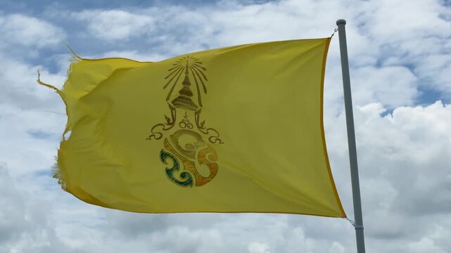 Yellow Royal Flag of King Rama X Waving Outdoors in Thailand