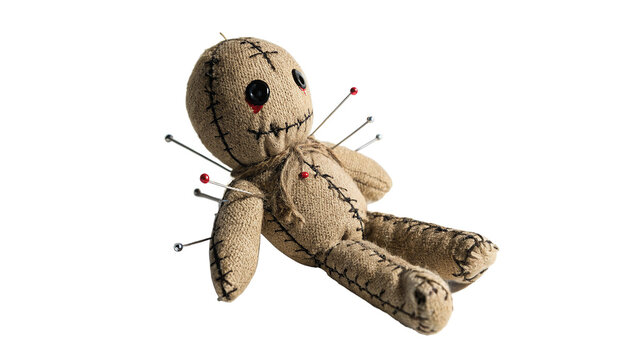 Spooky creepy voodoo doll textile toy with pins isolated on transparent background.
