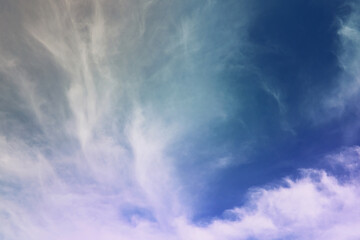 Fototapeta premium Beautiful sunset sky above clouds with dramatic light. Cabin view from airplane