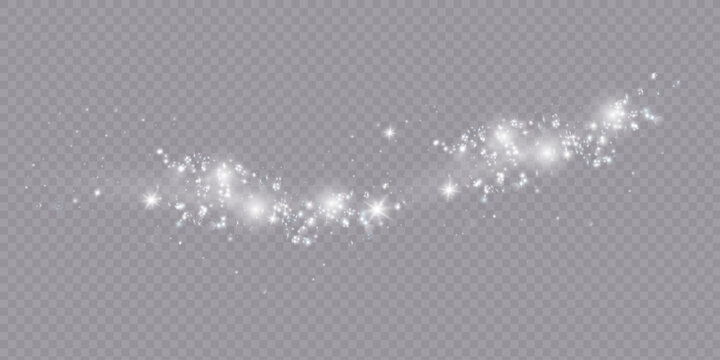 The dust sparks and golden stars shine with special light. Vector sparkles on a transparent background. Christmas light effect.