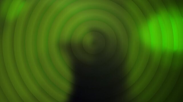 Abstract green circular ripple pattern with dark center and glowing light effects for modern digital graphic design backdrops