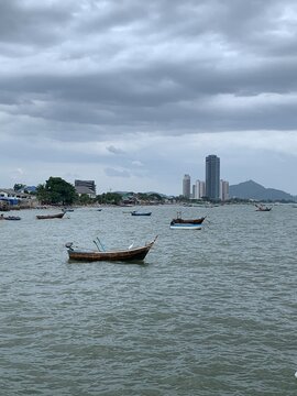 fishing boat and city view on background