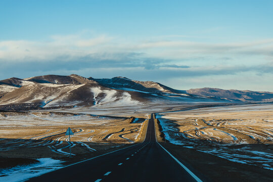 picturesque countryside, Mongolia with cascading down volcanic rock canyon in the scenic Mongolian steppe grassland