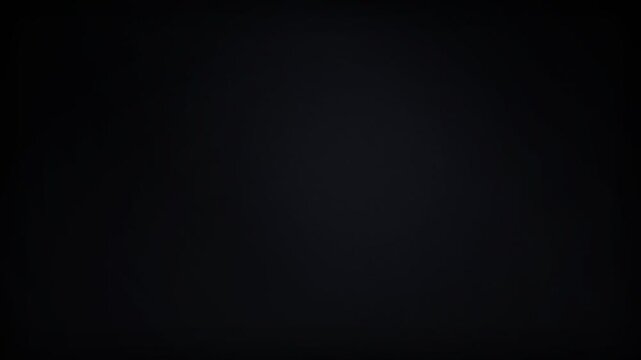 Minimalist dark textured background with subtle gradient shades of black and charcoal gray tones