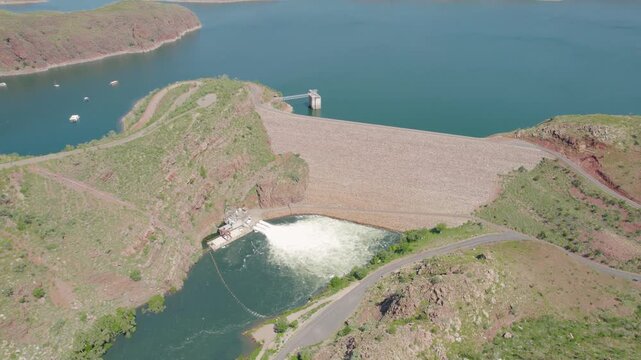 Dam Wall With Water And Boats On The Reservoir Near Kununurra