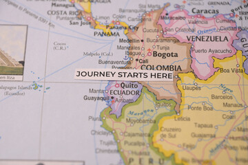 Obraz premium Journey starts here concept tag positioned over Quito and Ecuador on a South American map