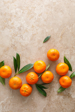 Mandarins fresh citrus fruit with green leaves
