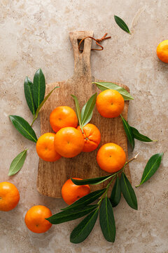 Mandarins fresh citrus fruit with green leaves