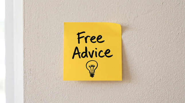 A yellow sticky note attached to a textured wall with the words free advice and an icon