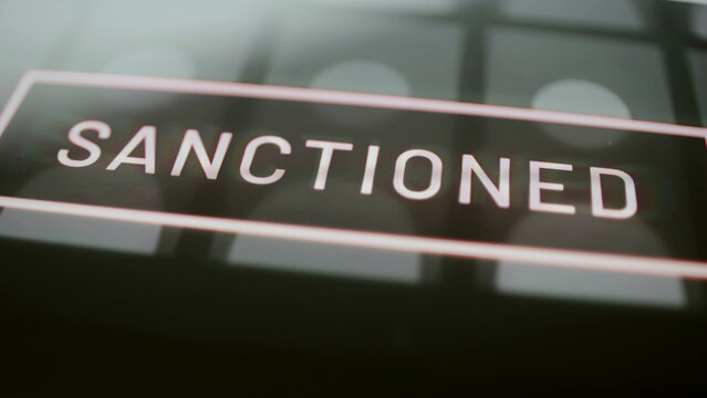 Large Sanctioned label over profile tiles