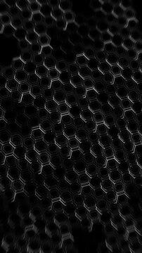 Black dimensional honeycomb pattern forms a deep futuristic tunnel metallic edges. cyber technology, science, engineering, graphene concepts, abstract transitions, industrial intros modern backgrounds