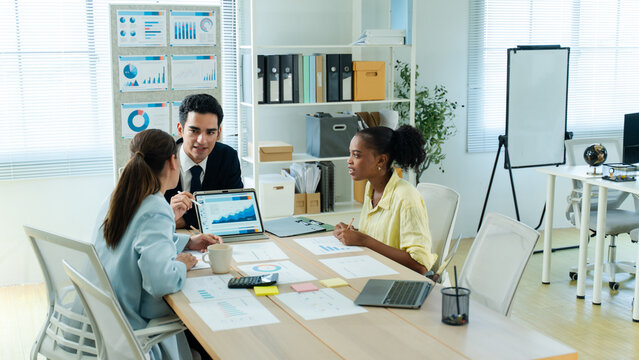 business people work together in office.Concept of teamwork and partnership.Team business working find solution together in office.Laptop,collaboration in the office while working on a company project