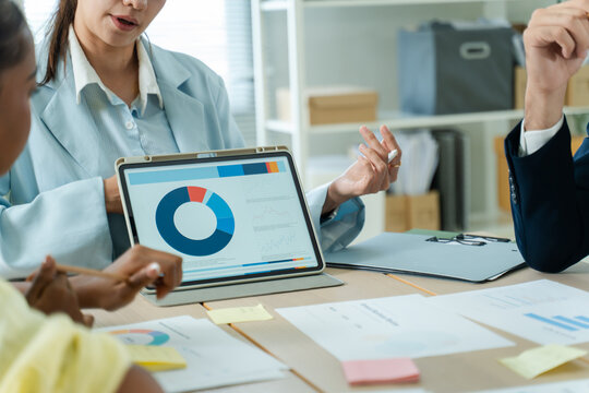 business people work together in office.Concept of teamwork and partnership.Team business working find solution together in office.Laptop,collaboration in the office while working on a company project
