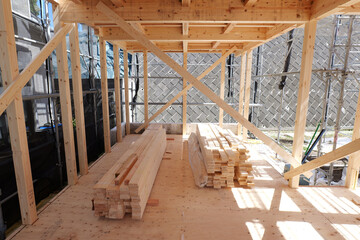 Timber Framing Structure of Residential Building at Construction Site, Low Angle View © Andriy Mishchak
