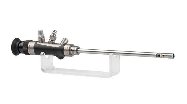 Medical endoscope surgical instrument resting on a transparent acrylic stand