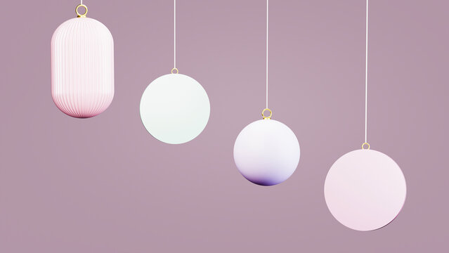 Pastel Christmas baubles suspended against a minimal background