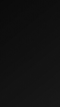 Dark carbon fiber texture fine diagonal stripes woven finish. motion adds rich depth product ad, automotive promos, technology presentations, title sequences, websites, broadcasts, corporate branding.