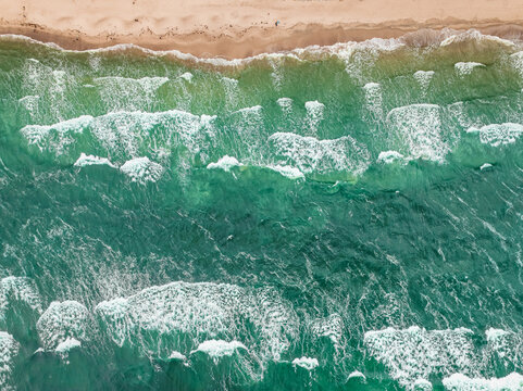 Poland's Baltic coastline during a summer storm with heavy waves.