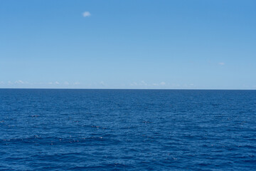 Obraz premium Calm Deep Blue Indian Ocean with Clear Horizon and Blue Sky Seychelles