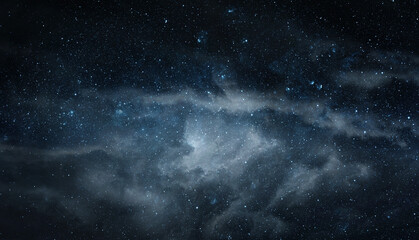 Fototapeta premium Dramatic deep space scene featuring the Milky Way stretching across a dark star-filled sky, with stars, cosmic clouds creating a mysterious panorama. Elements of this image furnished by NASA