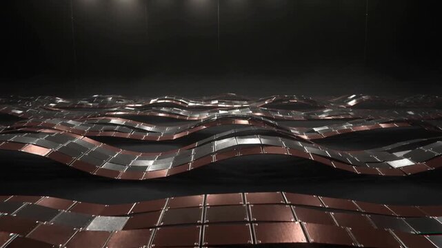Unit sending command, programmed sheet forming waves on dark stage, showing copper silver tiles