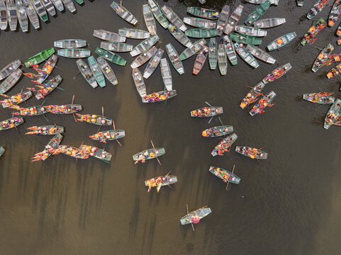 Tour boats at Tam Coc pier in Tam Coc, Ninh Binh, Vietnam