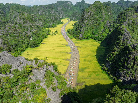 Long Tam Coc boat procession from above during the Tam Coc festival in Ninh Binh, Vietnam
