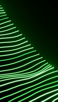 Green neon light lines forming abstract diagonal wave pattern