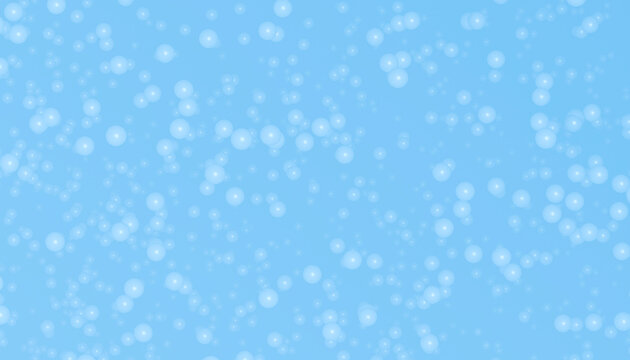 Cluster of translucent bubbles floating on blue background