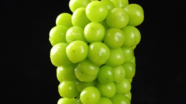 closeup of seedless green Shine Muscat grape background