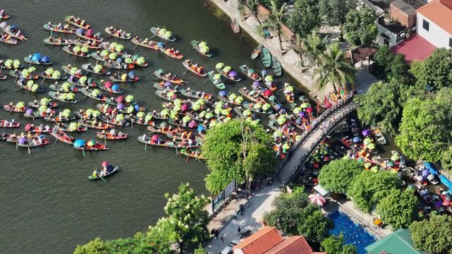 Crowded Tam Coc festival river during the Tam Coc festival in Ninh Binh, Vietnam