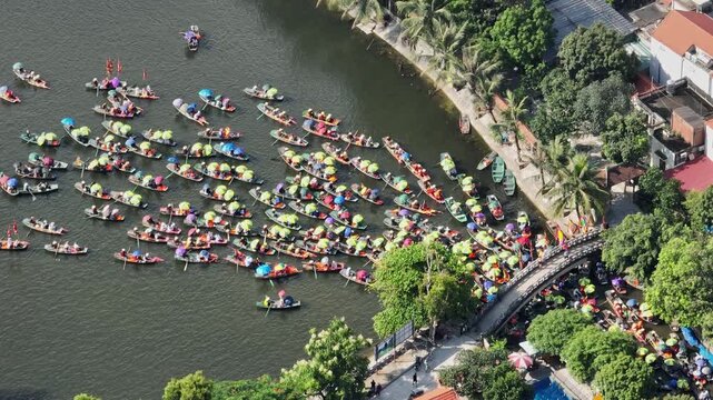 Tam Coc festival boats near bridge during the Tam Coc festival in Ninh Binh, Vietnam