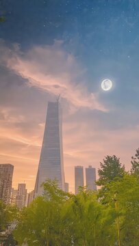 Modern Skyscraper Silhouette at Sunset and Moonrise: Urban Landscape with Lush Greenery and Cityscape View.