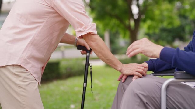 Happy Asian senior gay couple preparing daily medication and vitamins together at home. Elderly people organizing pills for healthy aging, healthcare routine, wellbeing support retirement lifestyle