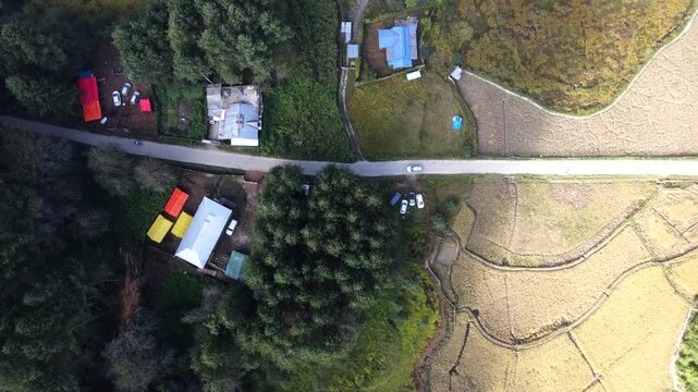 Drone shot of car passing through Ziro, Arunachal Pradesh