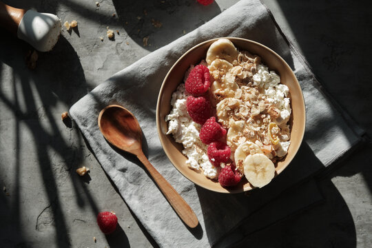 Breakfast oatmeal cereal with raspberry top view