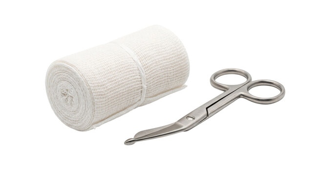 Medical gauze bandage roll and stainless steel bandage scissors. First aid equipment isolated on white