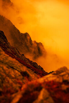 Photo of orange fog in the Tatra Mountains, Slovakia